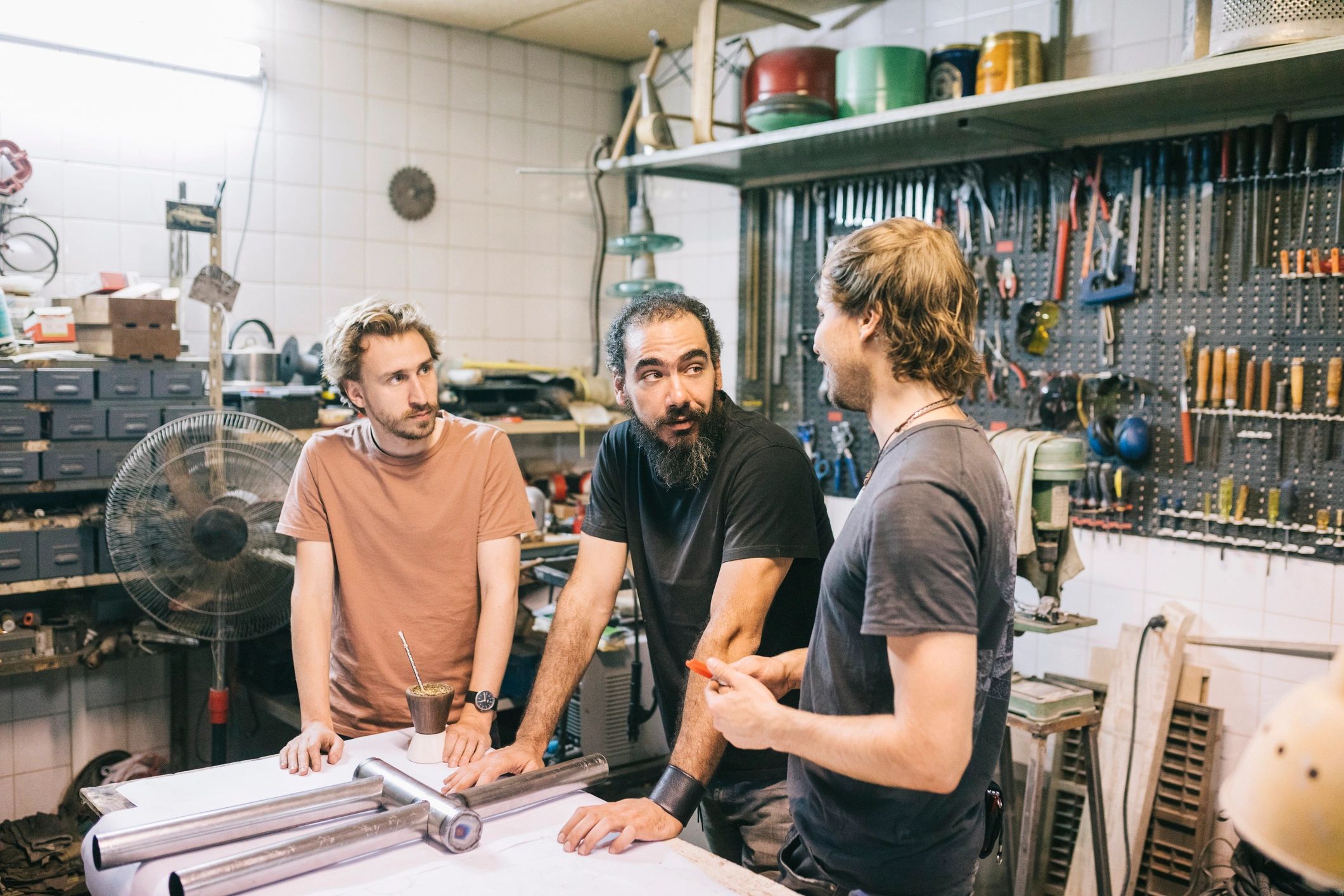Team meeting in a small workshop setting