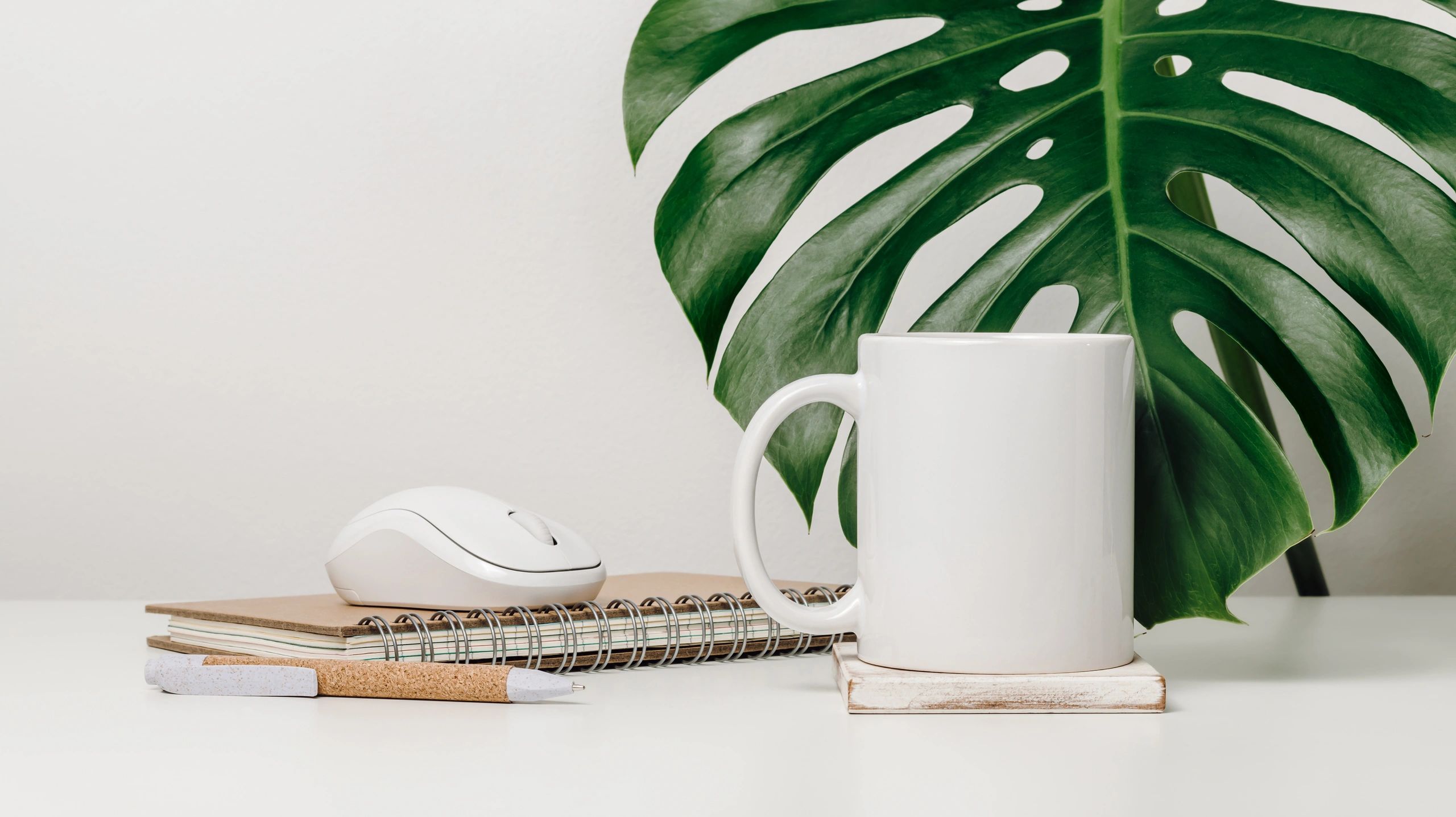 Branded mug mockup on a desk
